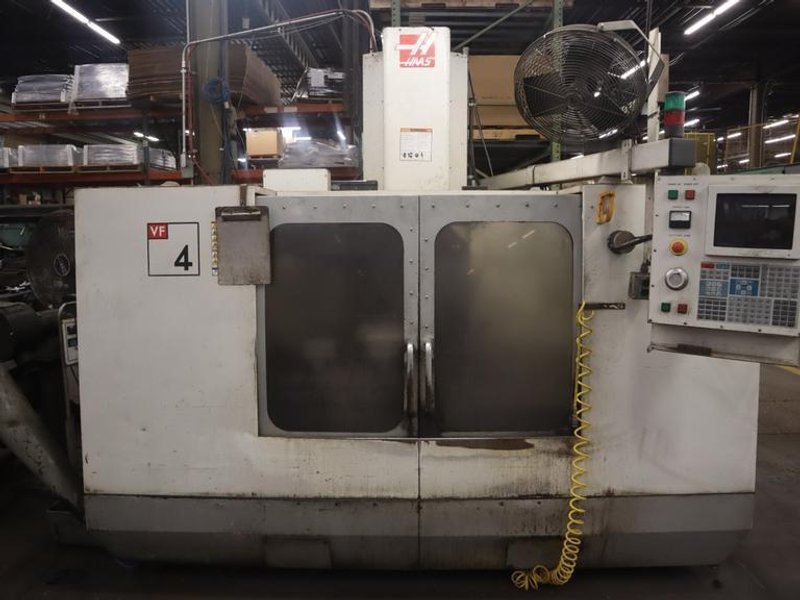 Haas VF-4 CNC Vertical Machining Center, 20 Station Carousel  Tool Changer, 7500 RPM Spindle, Chip Auger, Programmable Coolant- Auction Item