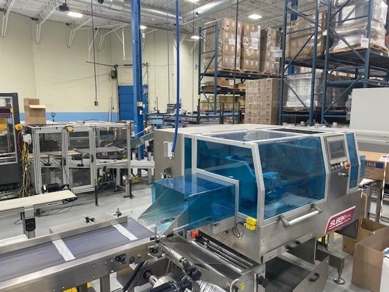 HIGH‑SPEED WEIGHPACK SLEEKWRAPPER I‑65 INVERTED – 60 PACKAGES/MIN • 650 MM WEB • STAINLESS‑STEEL