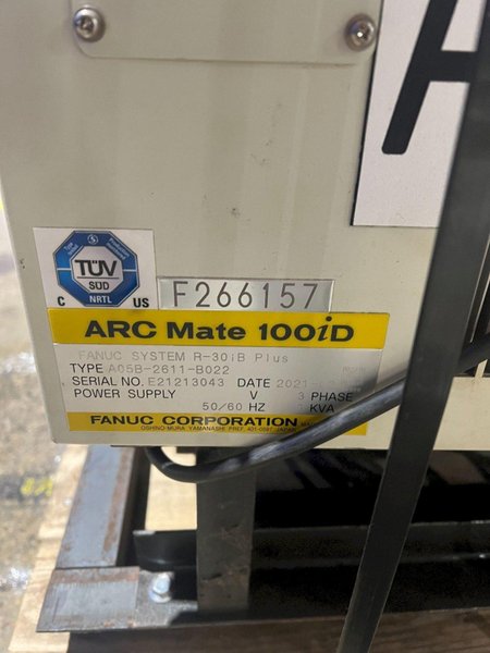 FANUC ARCMATE ROBOT 100ID/10L WITH R30IB PLUS AND MILLER AUTO CONTINUUM 500 USED