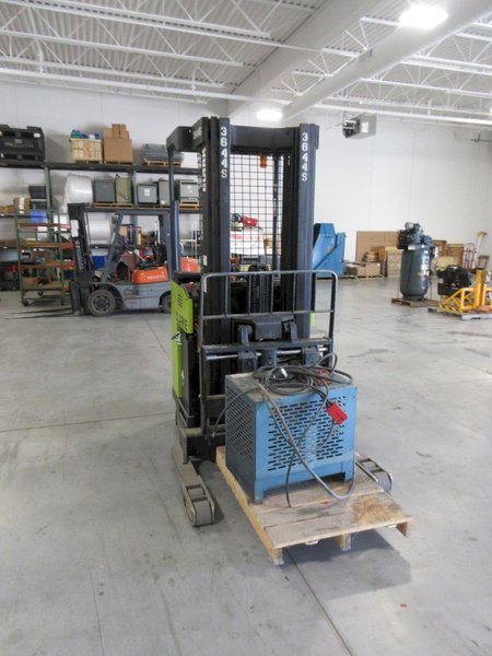 Clark NPR20 Electric Standing Reach Forklift with Auto 1000 24VCharger, 4000 LB Load Capacity- Auction Item