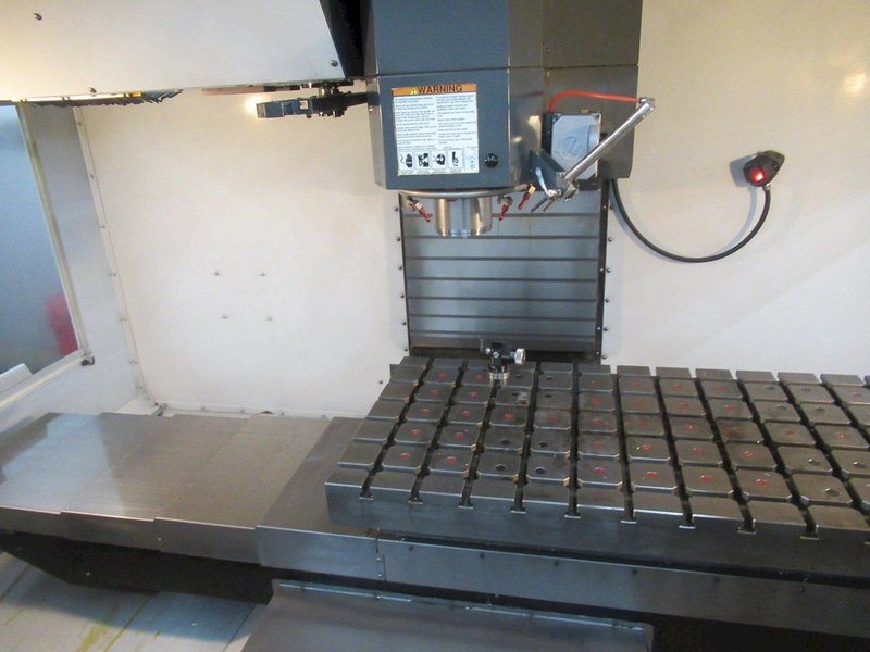 Haas VM-3 5-Axis CNC Vertical Machining Center, Haas TR-210 Trunnion, 40 Station Tool Changer, Probing, 300 PSI TSC, Chip Auger