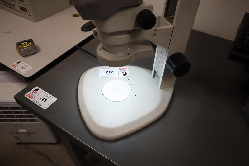 Nikon SMZ645 Stereo Zoom Microscope with Light Ring, .8-5X Zoom, 10X Eyepiece Lenses- Auction Item