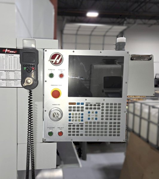Haas UMC-750SS 5-Axis 2018 with: 5th Axis, 12k RPM Spindle, Through Spindle Coolant, 40 ATC,  Probing, Chip Conveyor, and Coolant Tank.