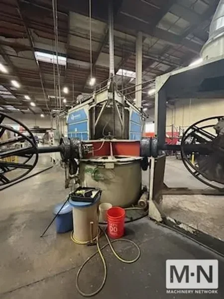 3 ARM MCNEILL MODEL 1500-64 ROTATIONAL MOLDING MACHINE