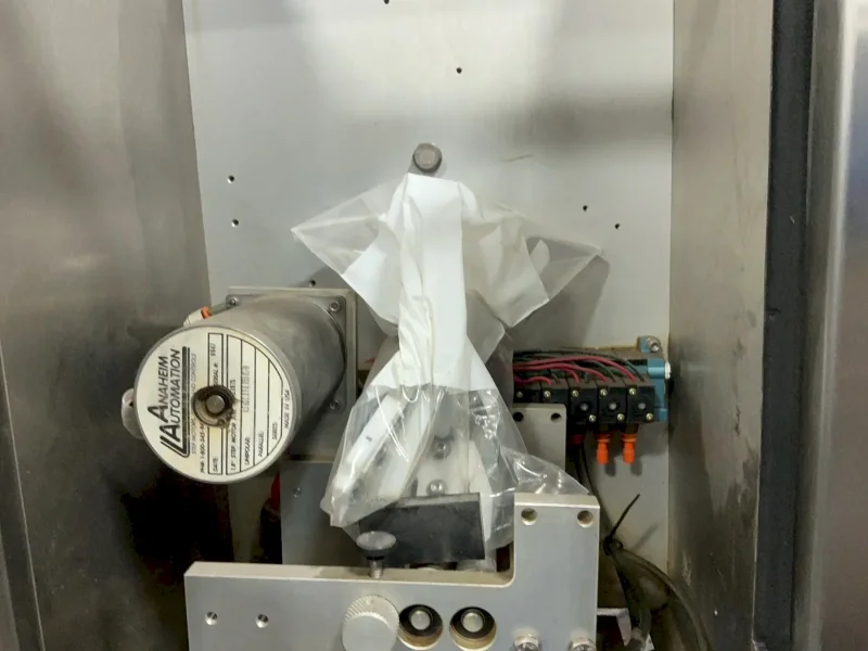 AXON CORPORATION SEALING MACHINE   -  EZ-100