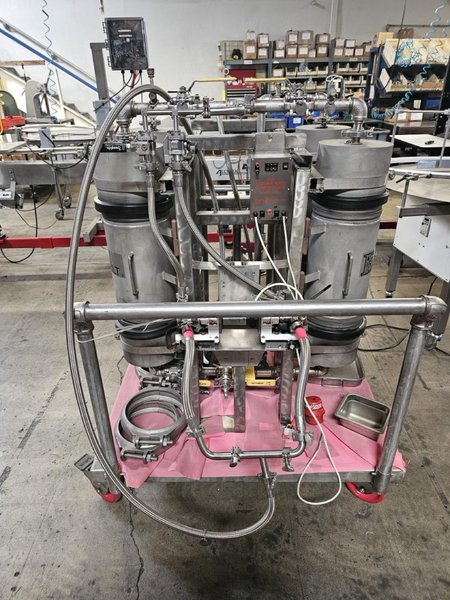 Accutek Bottling Line with Chadam Consultants 2 Head Gravity Filler, Accutek SA-1 Automatic Chuck Capper, Accutek APS106 Labelette Labeler, Everfilt Oil Filtration System, IBC Tanks