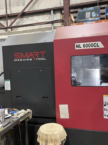 Smart NL6000CL CNC Lathe, 2021 – 10″ Thru Bore, Programmable Tailstock, Chip Conveyor, Very low hours