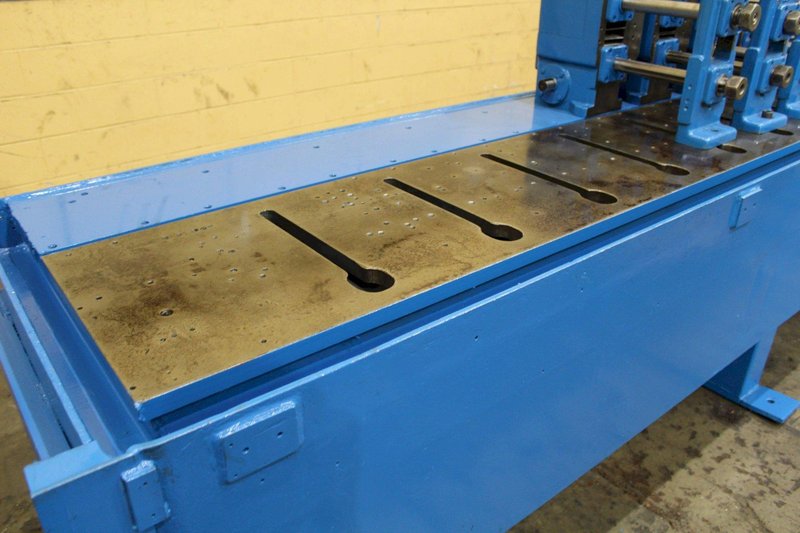 12 STAND BASE WITH (8) M-1/2&#039; YODER ROLLFORMER: STOCK #72176