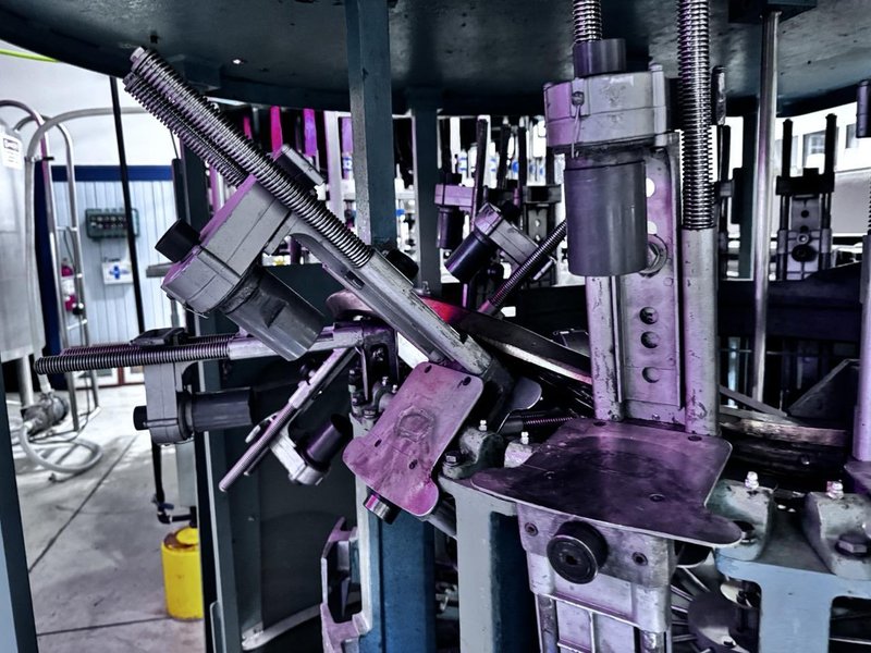 US Bottlers Gravity Vacuum 36 Head Rotary Bottle Filler- 100, 200, and 350ml Change Parts, Previous Use Liquor