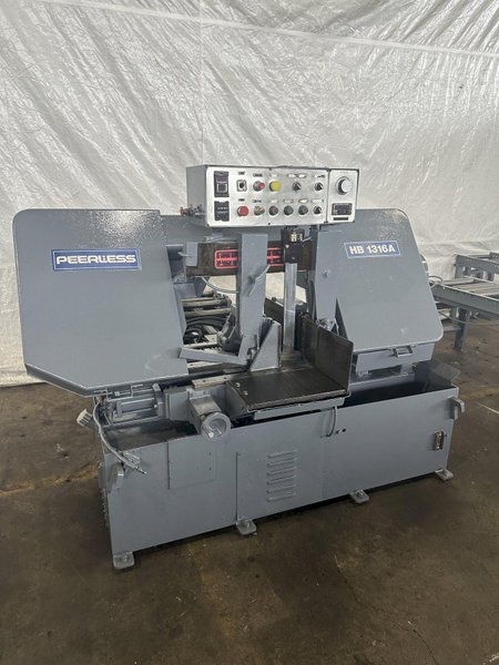 13" X 16" PEERLESS HB1316A HORIZONTAL BAND SAW W/ 10' INFEED AND 20' OUTFEED CONVEYOR. STOCK # 1164323.