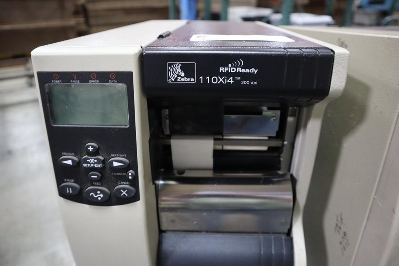 (2) Zebra 110Xi4 Label Printers, 203 dpi, 4&quot; Wide Label Cap - On Wire Cart with Labels- Auction Item
