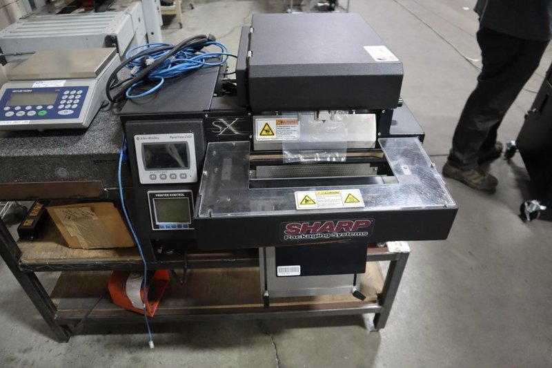 Bagging Center: SHarp SX-16H Bag Filler and Sealer, Metler Toledo Electronic Digital Scale, Granite Surface Plate, Steel Stand - Remote Foot Trip- Auction Item