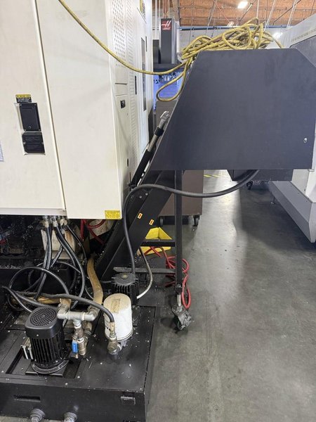YCM NXV560A-APC VMC, 2015 – Chip Conveyor, Fanuc Control, 12K RPM