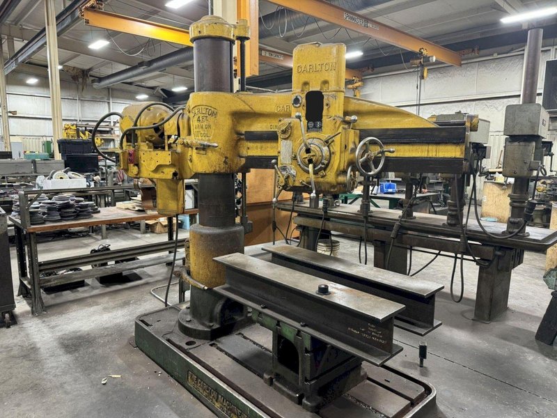 4' X 11" CARLTON RADIAL ARM DRILL. STOCK # 1114024.