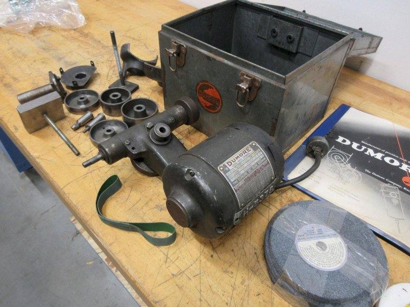 Dumore Tool Post Grinder Series 44, In Metal Case with Grinding Wheels and Accessories- Auction Item