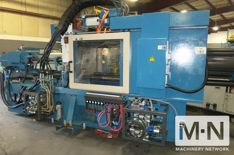 220 TON 6.2 OZ /0.6 OZ ARBURG MODEL 2-COLOR 570C2000-800/60 INJECTION MOLDING  MFG 2005