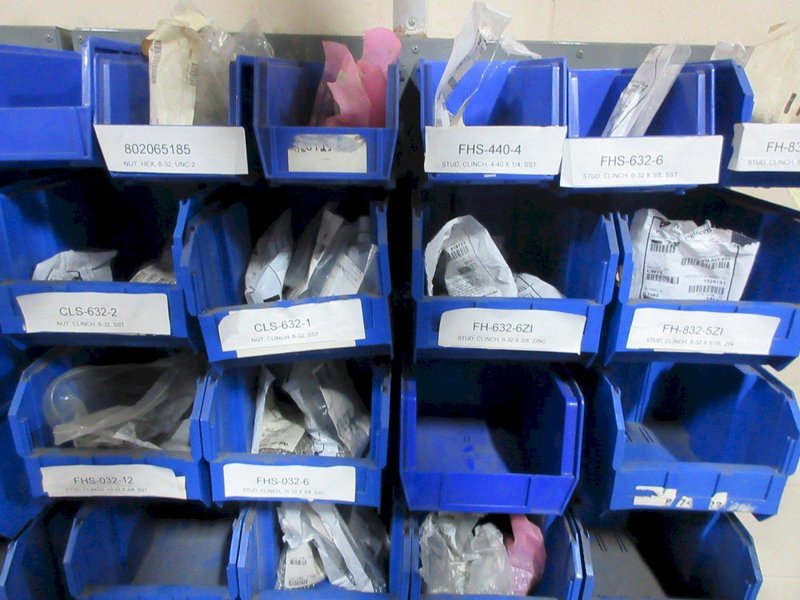 Plastic Bins Mounted to Wall with Contents of Assorted Hardware and Fasteners- Auction Item