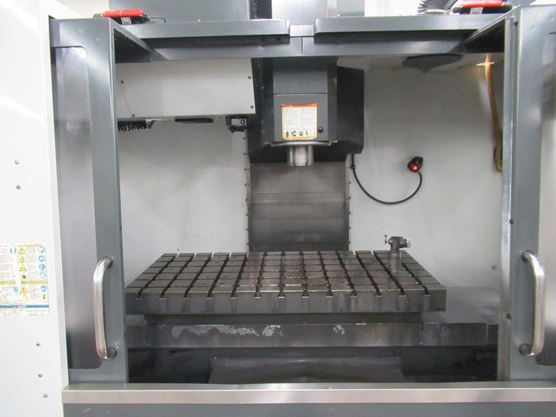 Haas VM-3 CNC Vertical Machining Center with 12,000 RPM CT-40 Spindle, 40 Station Side Mount Tool Changer, Probing, 1000 PSI TSC, High Speed Machining, Mist Collector,  Chip Auger.