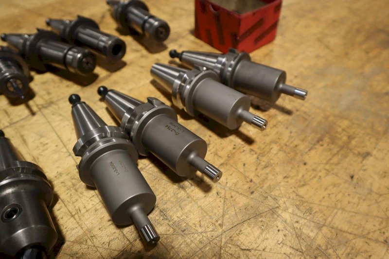 BT30 (14pcs) Tool Holders, (6) Nikken SK10 Collet Type with Extra Collets, (4) End Mill Holders, (4) .375 Pin Headed- Auction Item