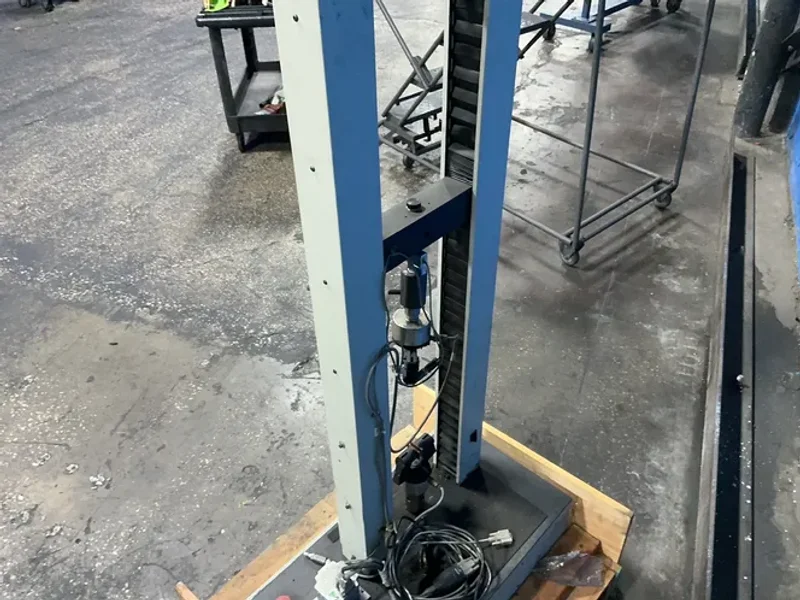 INSTRON SINGLE COLUMN ELECTROMECHANICAL UNIVERSAL TESTING MACHINE   -  1011