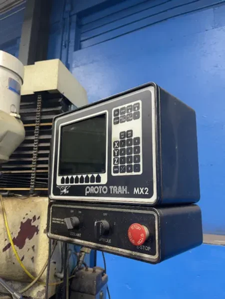 SWI 10” X 50” CNC VERTICAL MILL  -  TRAK-TRM