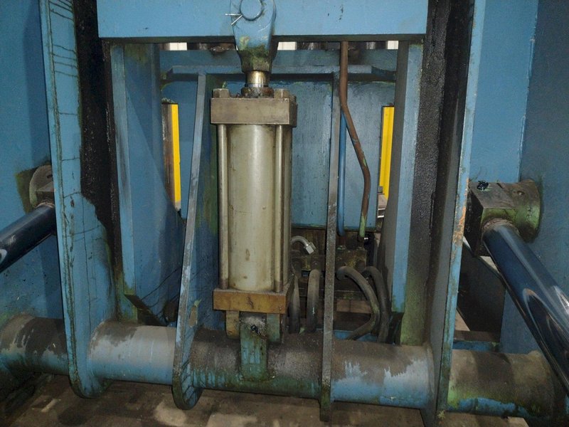 20,000 LBS BRANER HYDRAULIC COIL UPENDER WITH POWER FEED CONVEYOR: YOBRO #25238