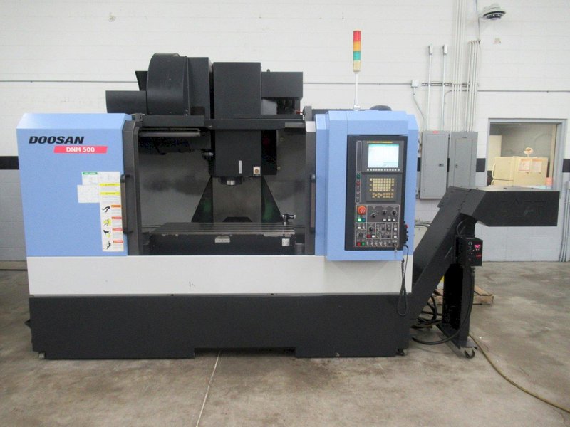 Doosan DNM 500 CNC Vertical Machining Center, 12K RPM Spindle, High Pressure Coolant, Renishaw Probing, Full 4th Axis, Chip Conveyor