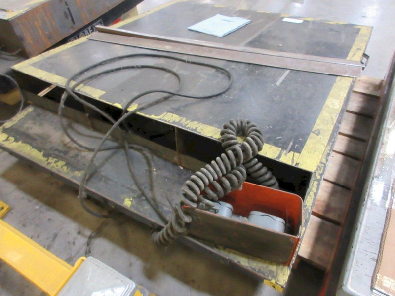 Autoquip Series 35 Scissors Lift  with 56" x 48" Table, Transition Ramp, Remote Foot Trip- Auction Item