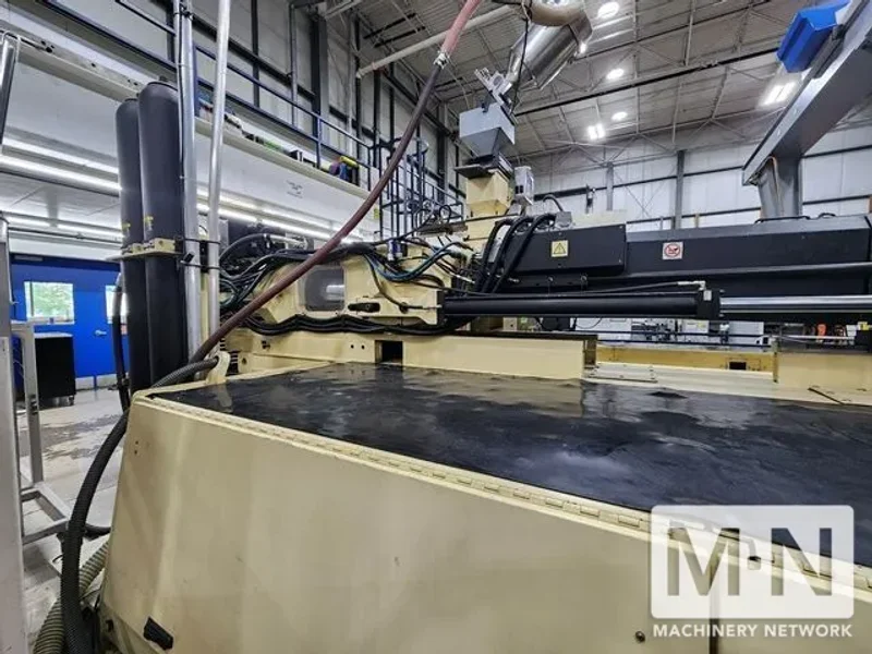 1100 TON 210 OZ HUSKY MODEL H1000RS135-115 INJECTION MOLDING MACHINE MFG 2005