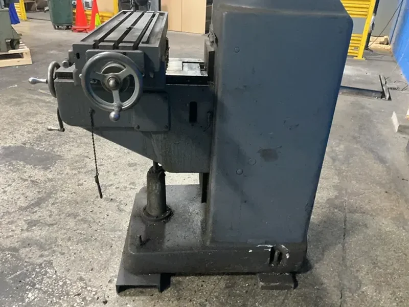 FAMCO 10” X 40” VERTICAL MILL  -  100