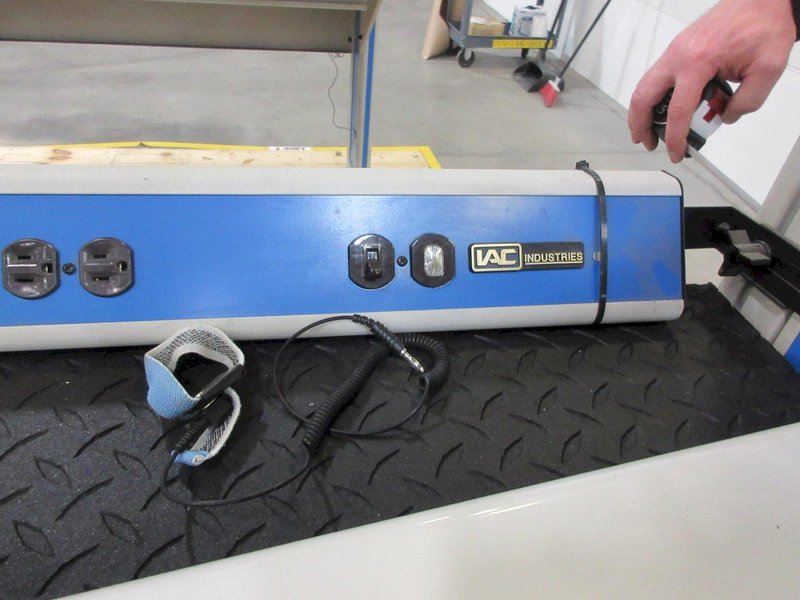 IAC Industries Work Station with Grounding Mat, Grounding Cable, Overhead Work Light, Power Strip and Adjustable Shelving- Auction Item