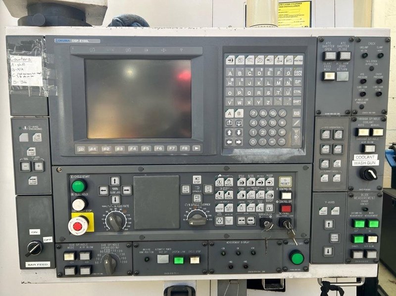 Okuma Macturn 350-W Multi-Axis CNC Lathe, 2004 – Chip Conveyor
