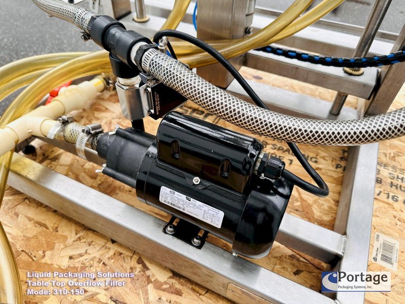 Liquid Packaging Solutions Model: 310-150  ||  Semi-Automatic Table Top Overflow Filler