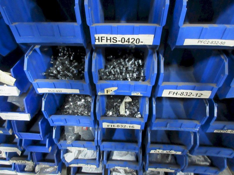 Plastic Bins Mounted to Wall with Contents of Assorted Hardware and Fasteners- Auction Item