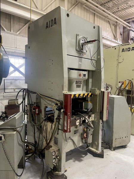 121 ton Aida NS1-1100 Single Point Eccentric Geared Straight Side Mechanical Metal Stamping Press, New 2001