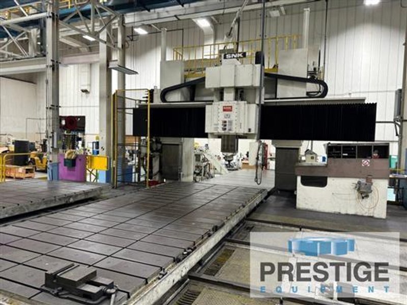 SNK DC-6ASM CNC 5-Face Bridge Mill W/2-Tables
