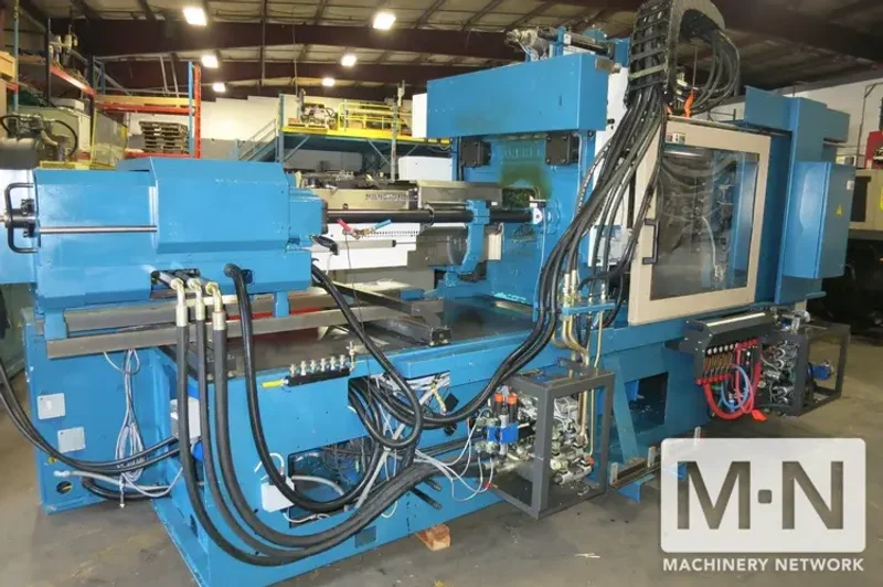 220 TON 6.2 OZ /0.6 OZ ARBURG MODEL 2-COLOR 570C2000-800/60 INJECTION MOLDING  MFG 2005