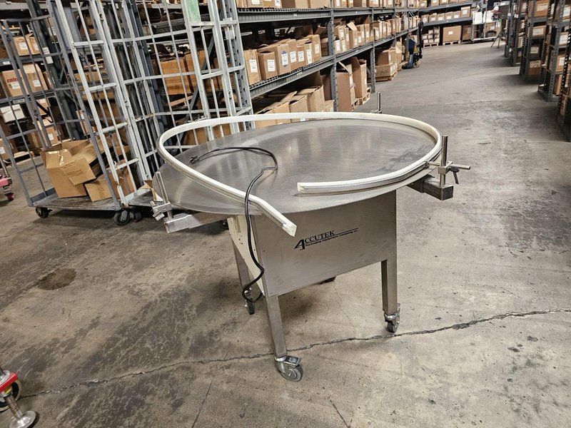 Accutek Bottling Line with Chadam Consultants 2 Head Gravity Filler, Accutek SA-1 Automatic Chuck Capper, Accutek APS106 Labelette Labeler, Everfilt Oil Filtration System, IBC Tanks