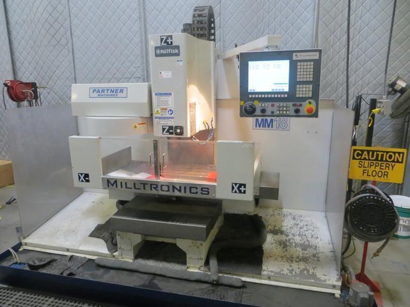 Milltronics Partner MM18 Vertical CNC Machining Center W Milltronics 7200 Control, 16 Station Carousel Tool Changer, Coolant Tank &amp; Pump and MORE!- Auction Item