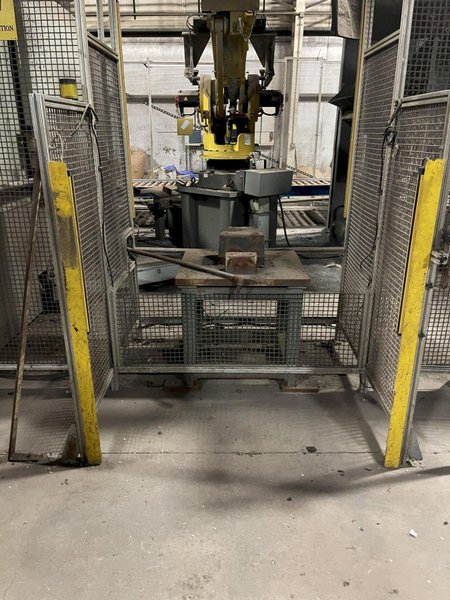 2005 Eagle automated saw and knockout system s/n 05027 with enclosure with light curtain, 2005 Fanuc robot model M-900iA 350 s/n r05743652 with Fanuc system R-J3iB controls s/n e05608535, with saw grips, Eagle enclosure with core knockout system, Allen Bradley plc with panelview 700, core butt discharge conveyor with drive, gate and riser dropoff, related conveyors
