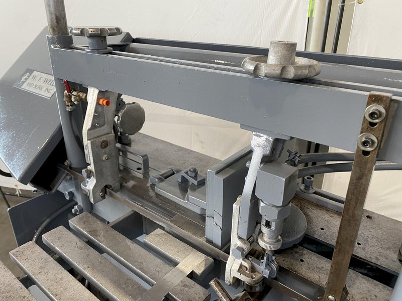 9" x 18" W. F. WELLS HORIZONTAL BANDSAW w/ DUAL COLUMNS. STOCK #0741422.