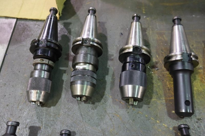 CT40 Taper Tool Holders: (3) Keyless Drill Chucks, (7) End Mill Holders- Auction Item