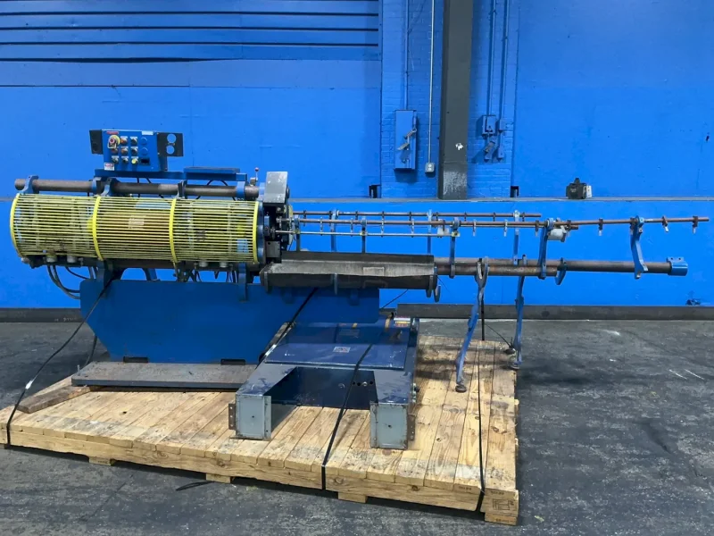 WIRE STRAIGHTENING AND CUTTING MACHINE