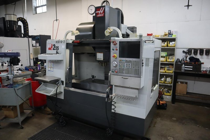 Haas VF-2SS CNC Vertical Machining Center, 12K Spindle, 24 Station SMTC, Probing, TSC, Chip Auger, 4th-Axis Brushless Drive - NEW 2014- Auction Item