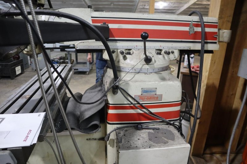 Trionics Handyman Vertical Knee Mill, Variable Speed, Accurite 2 Axis DRO, Power Table Feed- Auction Item