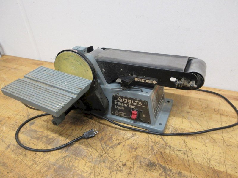 Delta 4" Belt, 6" Disc Bench Top Sander, with Tilting Work Surfaces and 2.25" Dust Outlet- Auction Item