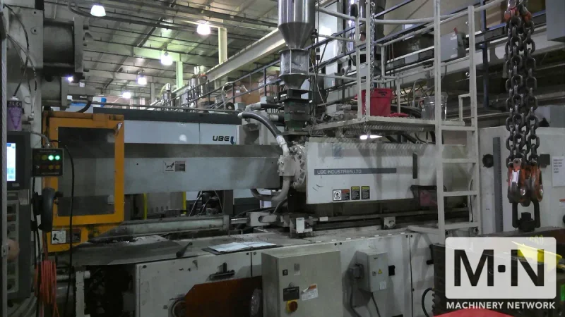 1000 TON 185 OZ UBE MODEL UM1000 INJECTION MOLDING MACHINE MFG 1999