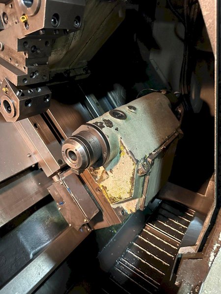 Doosan Daewoo Puma 300C CNC Lathe, 2005 – 15″ Chuck, Chip Conveyor, Programmable Tailstock