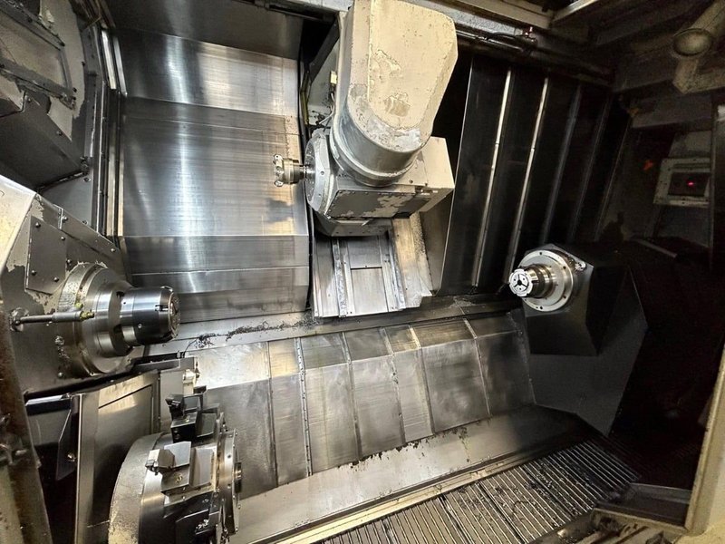 Okuma Macturn 350-W Multi-Axis CNC Lathe, 2004 – Chip Conveyor