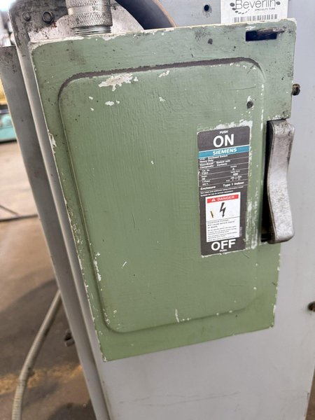 2500 LB X 12&quot; AMERICAN MODEL 60 MOTORIZED UNCOILER. STOCK # 0883725